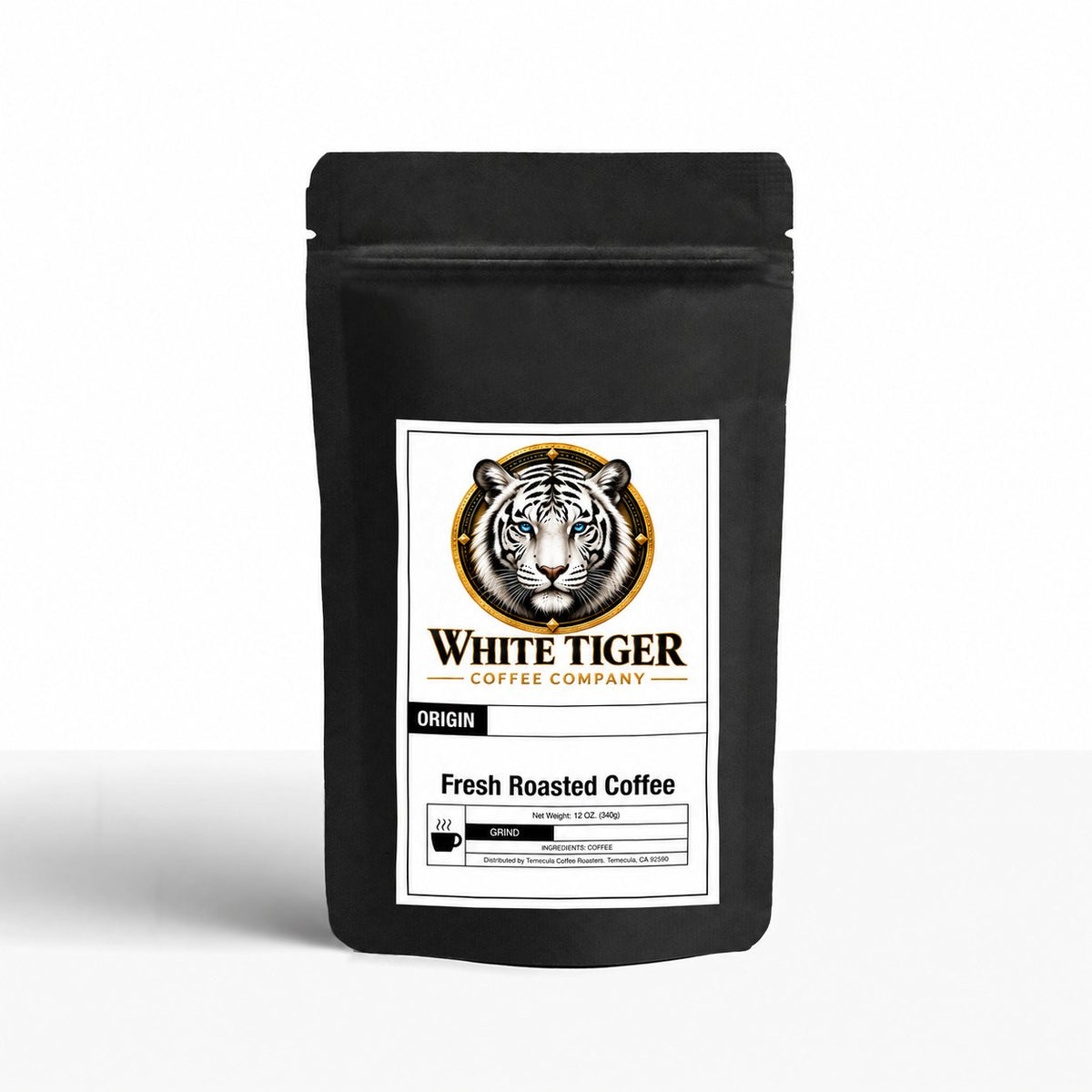 Coffee bag for White Tiger Signature, matte black resealable pouch with a white label featuring a tiger emblem and gold accents.