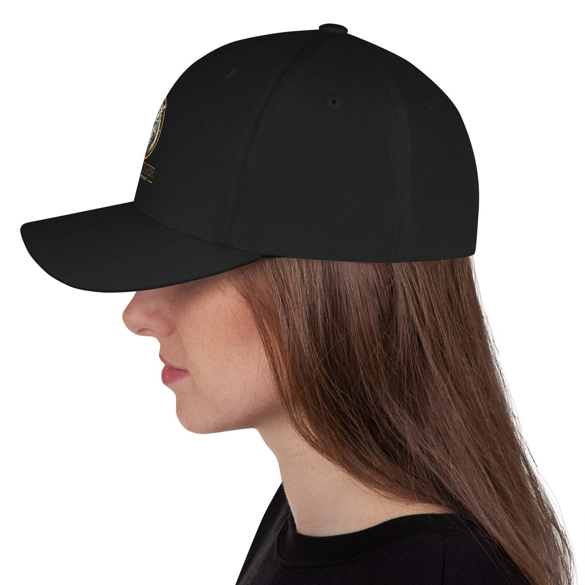 Structured Twill Cap in black twill with a structured six-panel crown, embroidered eyelets, and a curved visor.