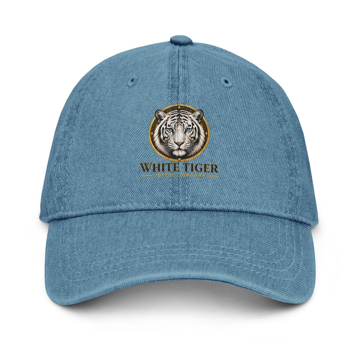 Denim Hat in blue cotton denim, featuring a curved stitched brim and embroidered tiger emblem with lettering.