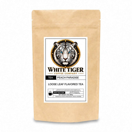 Peach Paradise loose leaf tea in a kraft paper pouch, featuring a White Tiger Coffee Company label
